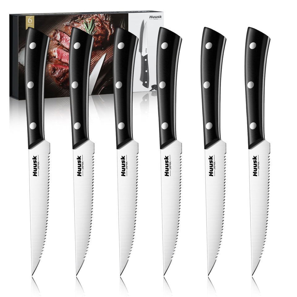 Huusk 6-piece steak knife set on the dining table for effortless slicing.