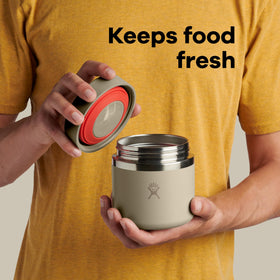 Hydro Flask Food Jar easy grip lid in use for quick access.