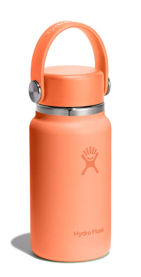 Hydro Flask Micro Bottle Nectar Orange shown with espresso for travel-ready hot drink.