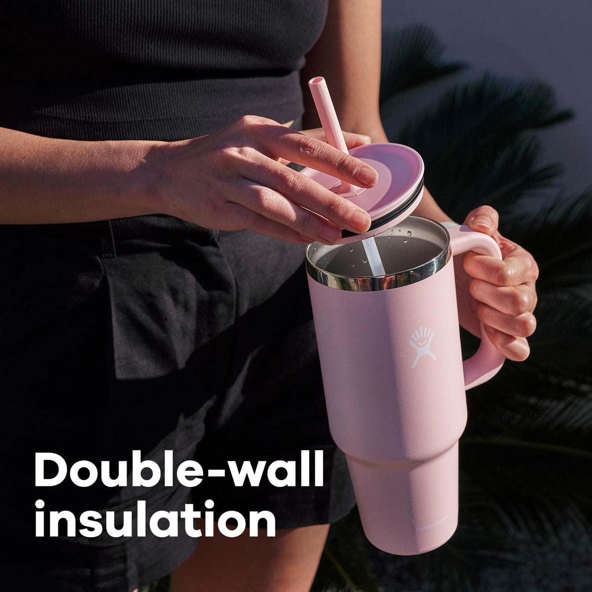 Leak-resistant lid with flexible straw for sipping.