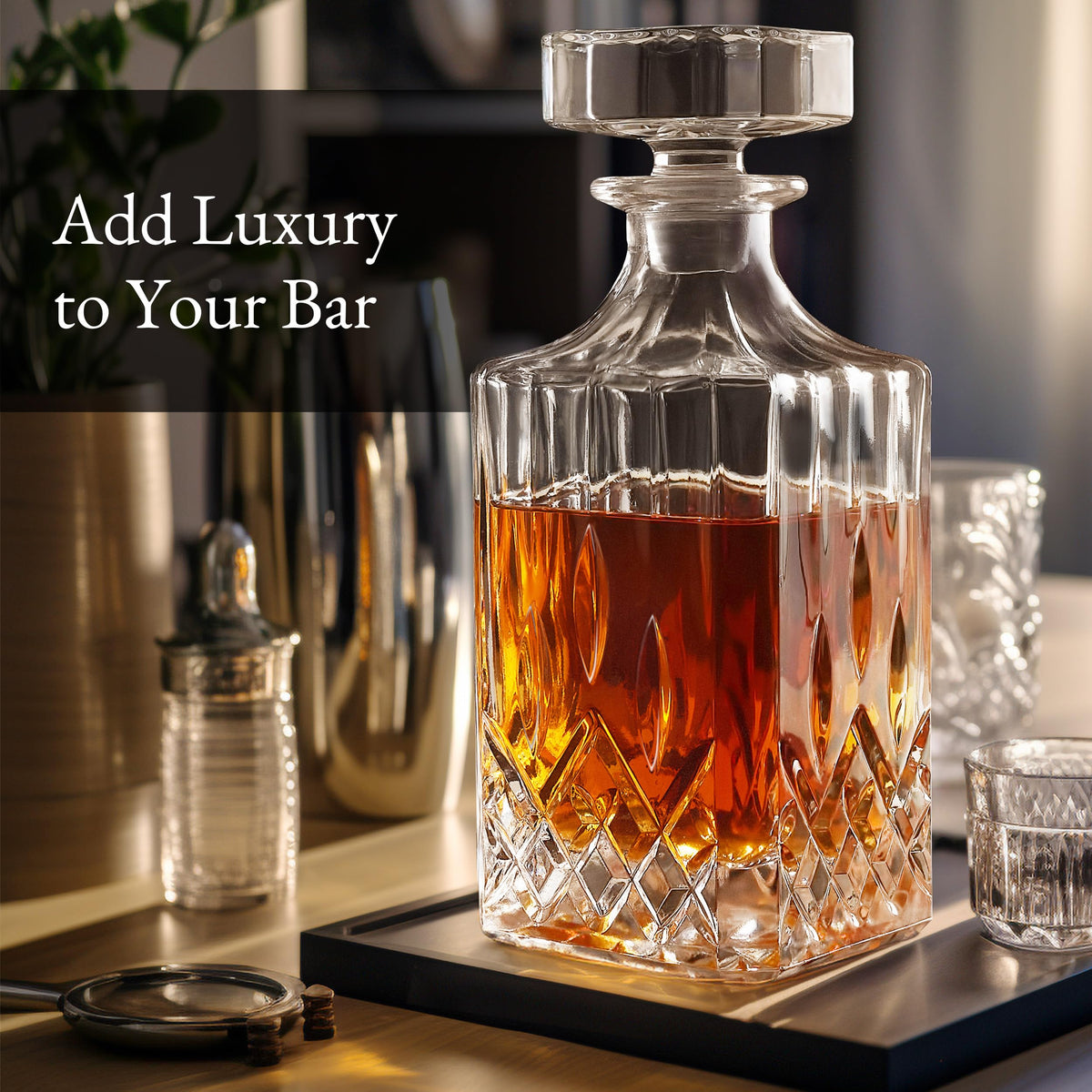 Hydro Gizmos four signature whiskey glasses arranged beside the decanter