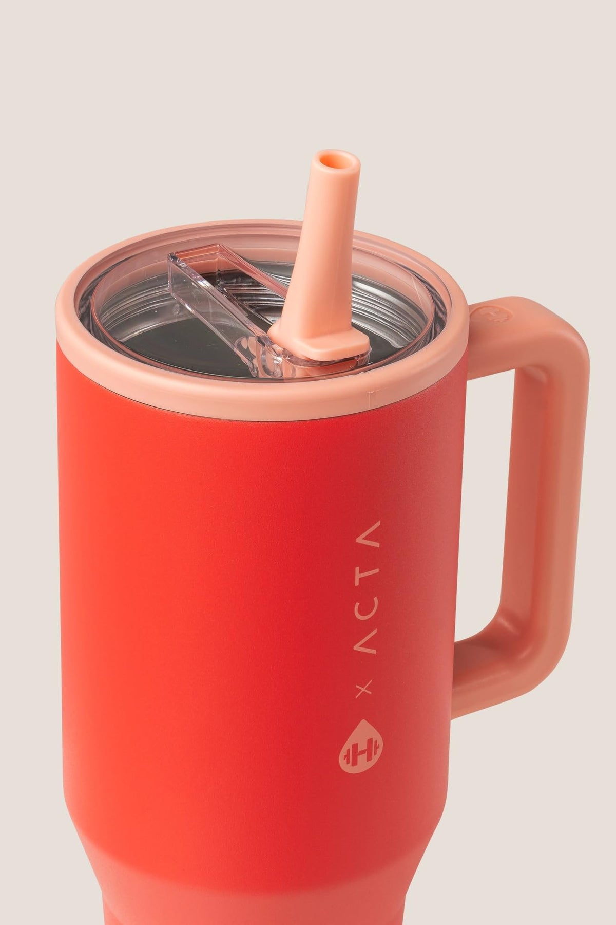 HydroJug Traveler flip straw shown for convenient sipping on the go.