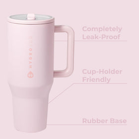 HydroJug Traveler leak-proof rubber base keeps bottles stable on slick surfaces.