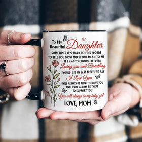 Hyturtle To My Daughter mug holding hot coffee with steady grip.