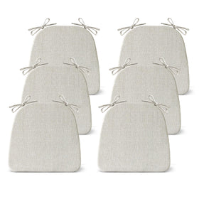IASEAHK dining chair cushion set on a beige chair for added comfort.