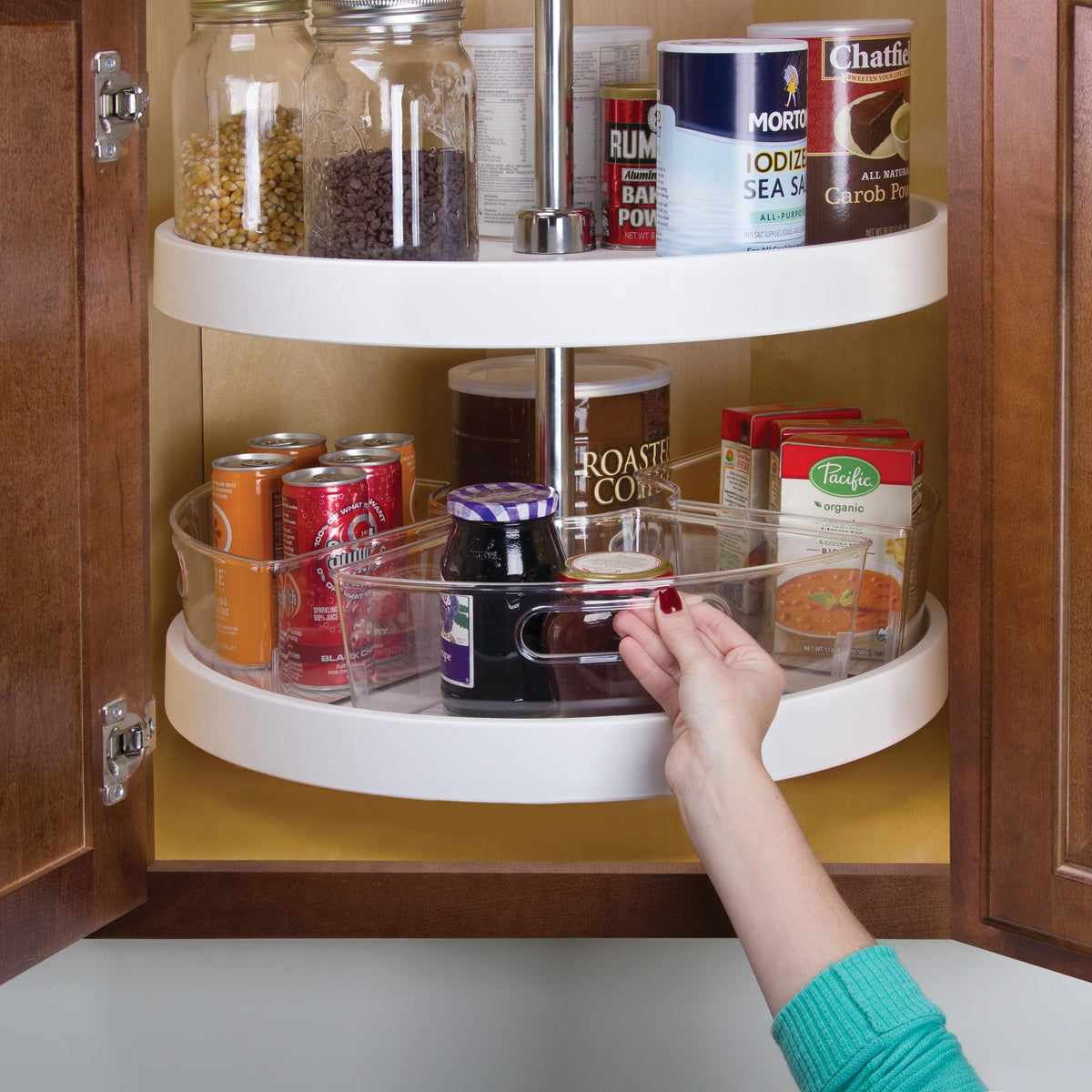 Built-in handles on the iDesign wedge bin let you slide it between shelves.