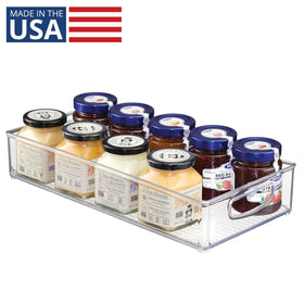 iDesign clear bin with easy-grip handles for portable kitchen and cabinet organization.