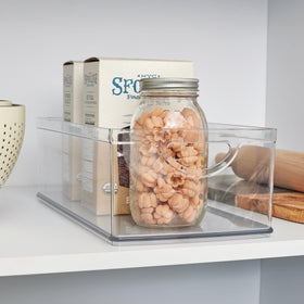 iDesign durable clear bin with stackable design for small-space use.