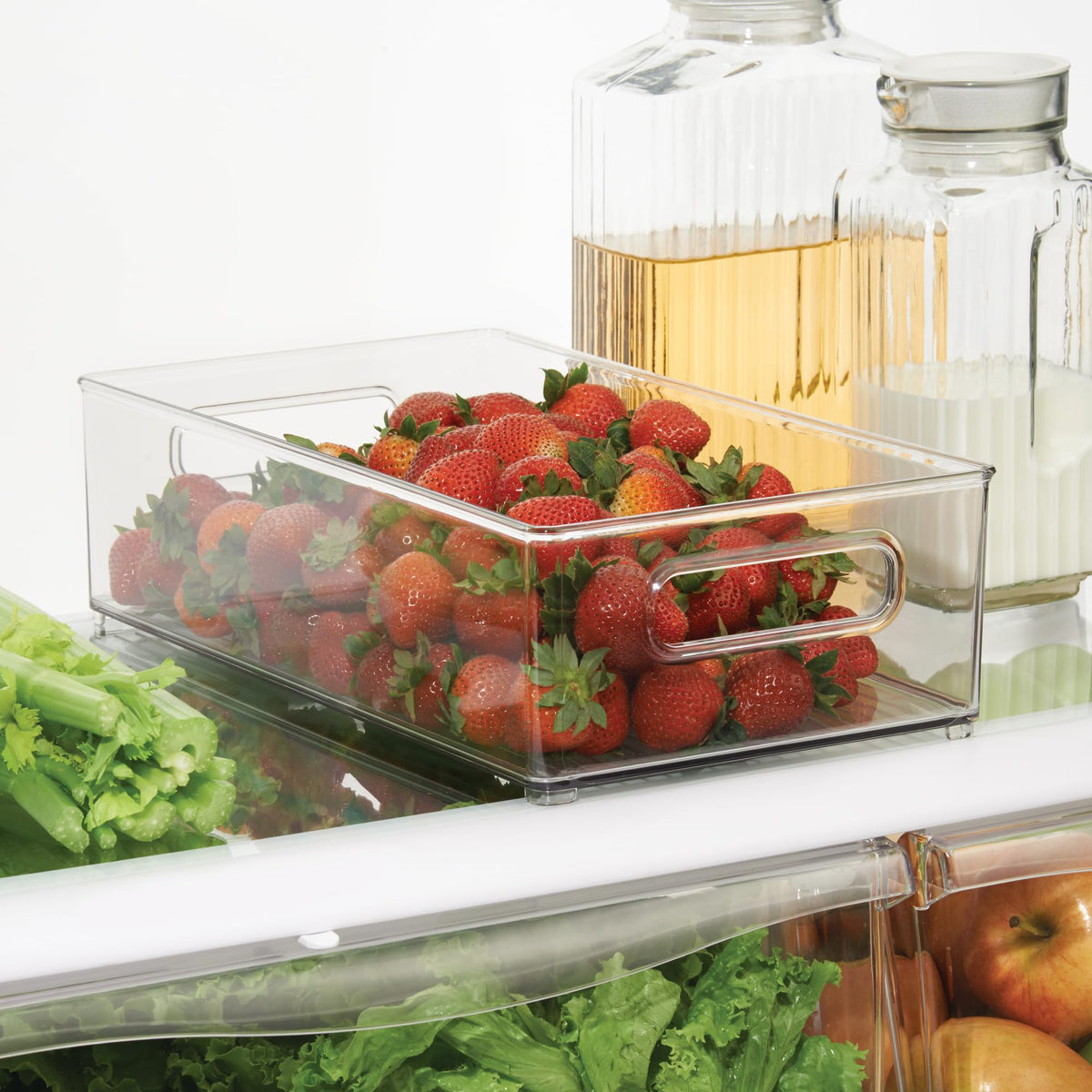 iDesign fridge bin with integrated handles for effortless rearranging.