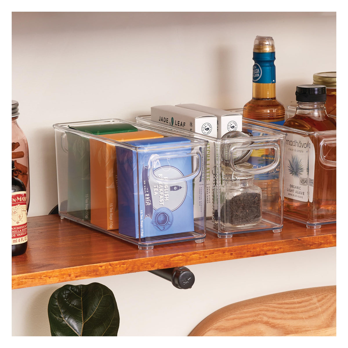 Idesign Slim clear bin condiment rack for neat fridge organization.