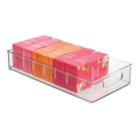 iDesign stackable elongated bin for pantry shelves keeps items accessible and neatly organized.