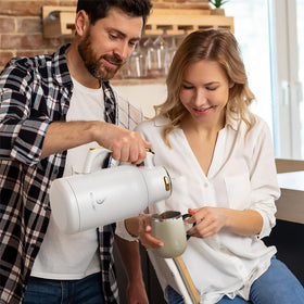 Ideus carafe shown in home and office settings for versatile use