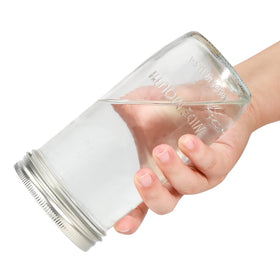 Ieavier frosted glass jar with stable non-slip base.