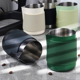 IKAPE silicone grip pad on frothing pitcher adds comfortable control.