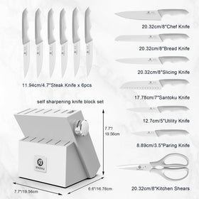 full 14-piece knife set arranged in a wood block for kitchen prep