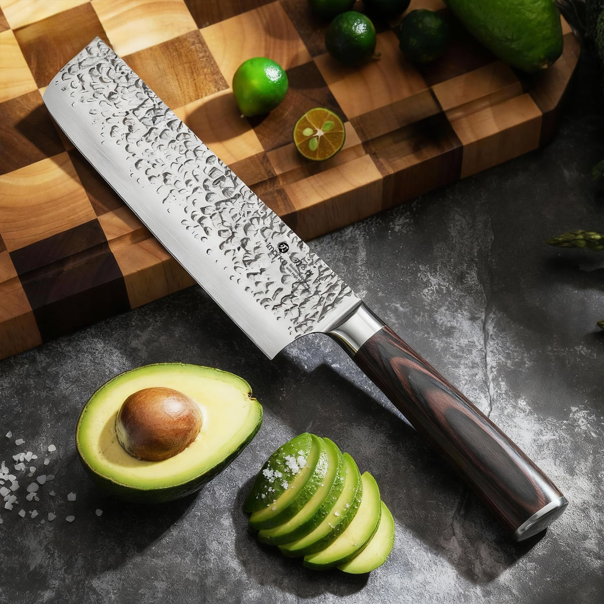 Imarku Nakiri Knife hollow-edge design enhances food release during chopping.