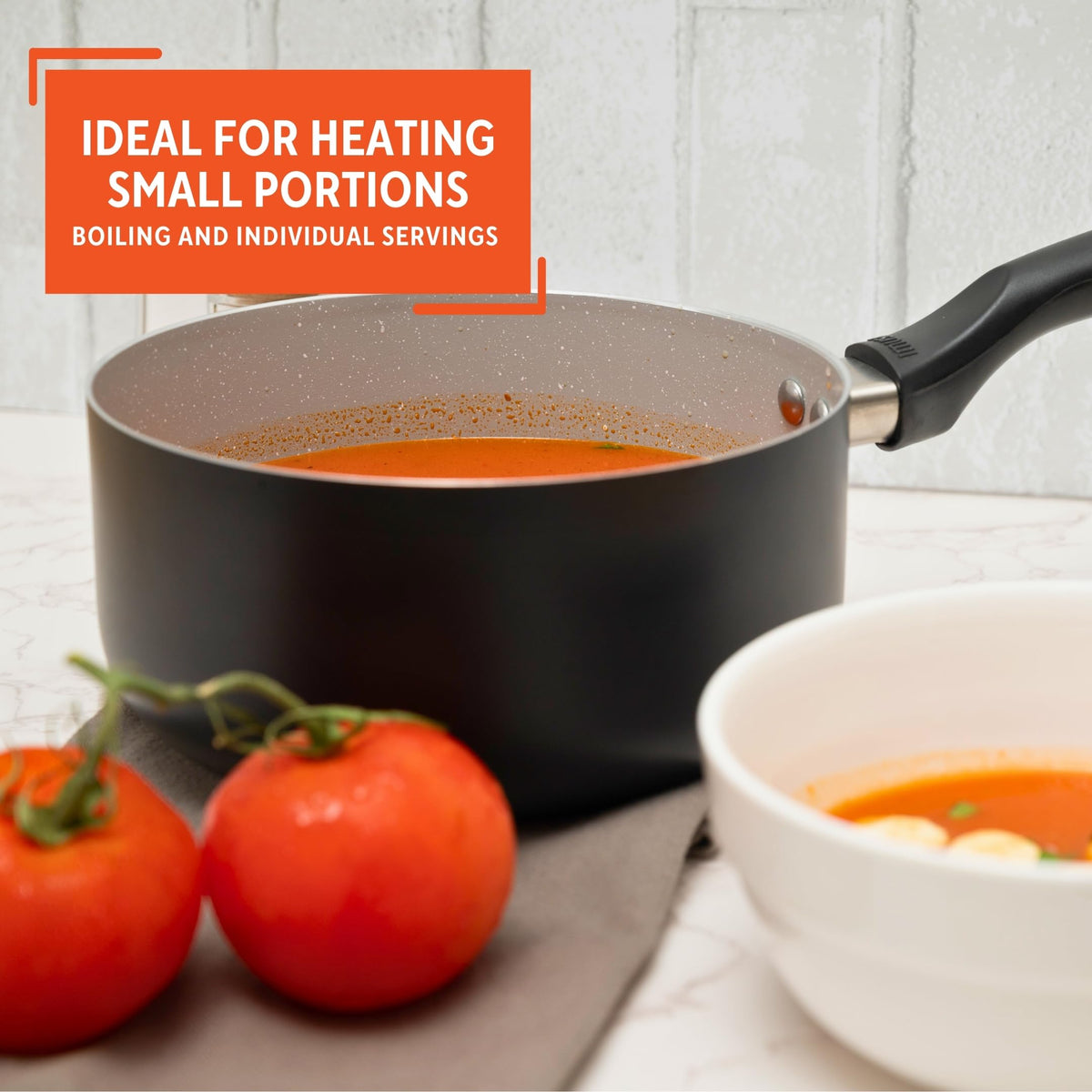 Imusa 2.0 qt saucepan in action for sauces and quick heating tasks.