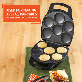 Imusa 6-slot capacity enables cooking multiple arepas at once
