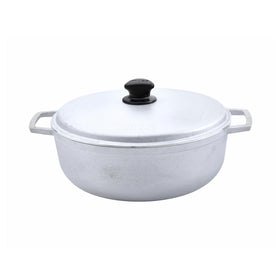 Imusa 7.5-quart caldero with lid on, ideal for large-batch rice and stews.