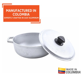 IMUSA caldero lid with steam vent for moisture control during cooking.