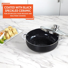 IMUSA glass lid with steam vent seals in moisture and flavor.