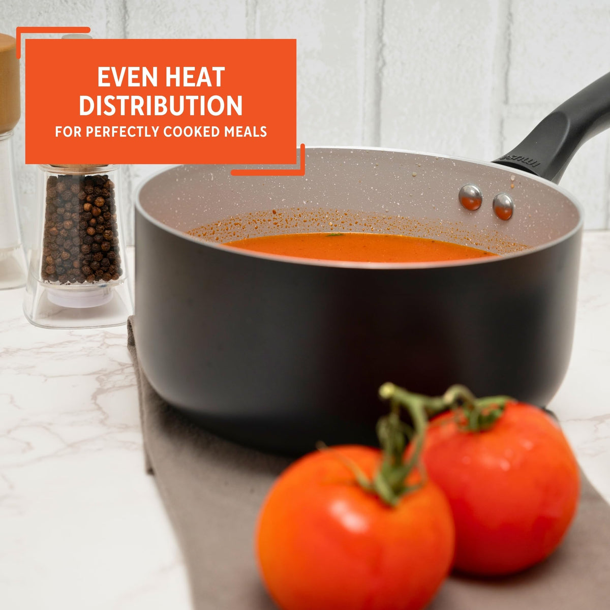 Imusa gray speckled ceramic interior adds aesthetic appeal and practical nonstick surface.