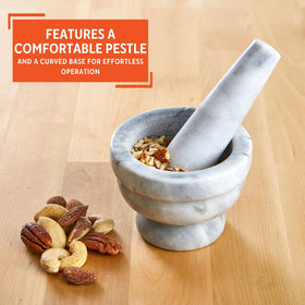 IMUSA marble mortar and pestle garlic and ginger mashing for smooth pastes.