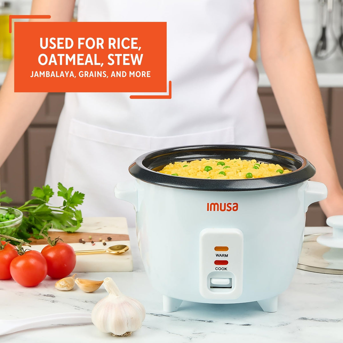 Imusa mini electric rice cooker transparent lid lets you monitor progress.