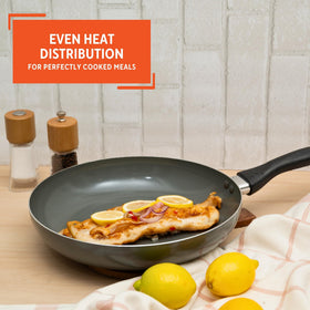 IMUSA skillet perfect for stir-frying veggies and proteins with minimal oil.
