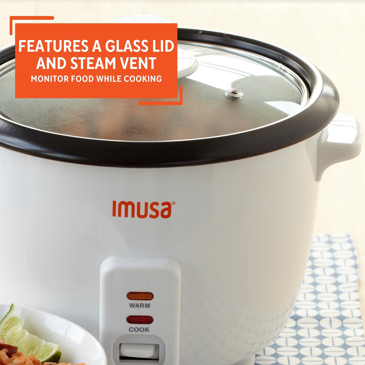 IMUSA white rice cooker steaming grains to perfection.