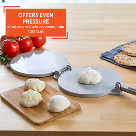 IMUSA press with arepas and flatbreads for versatile kitchen use