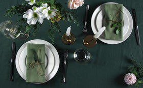 INFEI olive green napkins paired with tableware to elevate decor