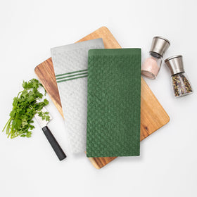 Green-colored Infinitee Xclusives towel brightens kitchen aesthetics.