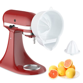 InnoMoon juicer attachment mounted on KitchenAid hub for easy citrus juice extraction into a bowl.
