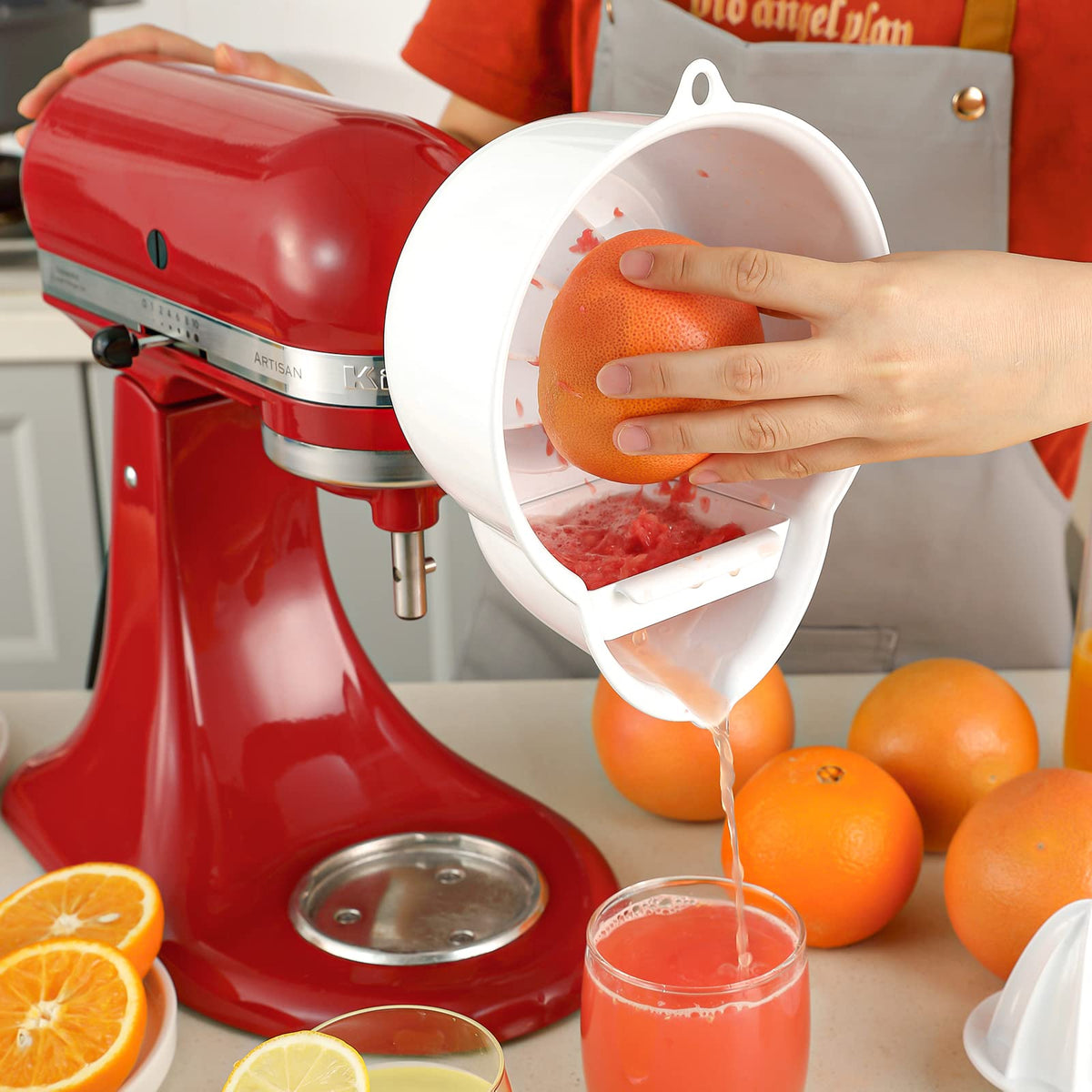 InnoMoon juicer attachment hooks on the mixer with a built-in buckle.