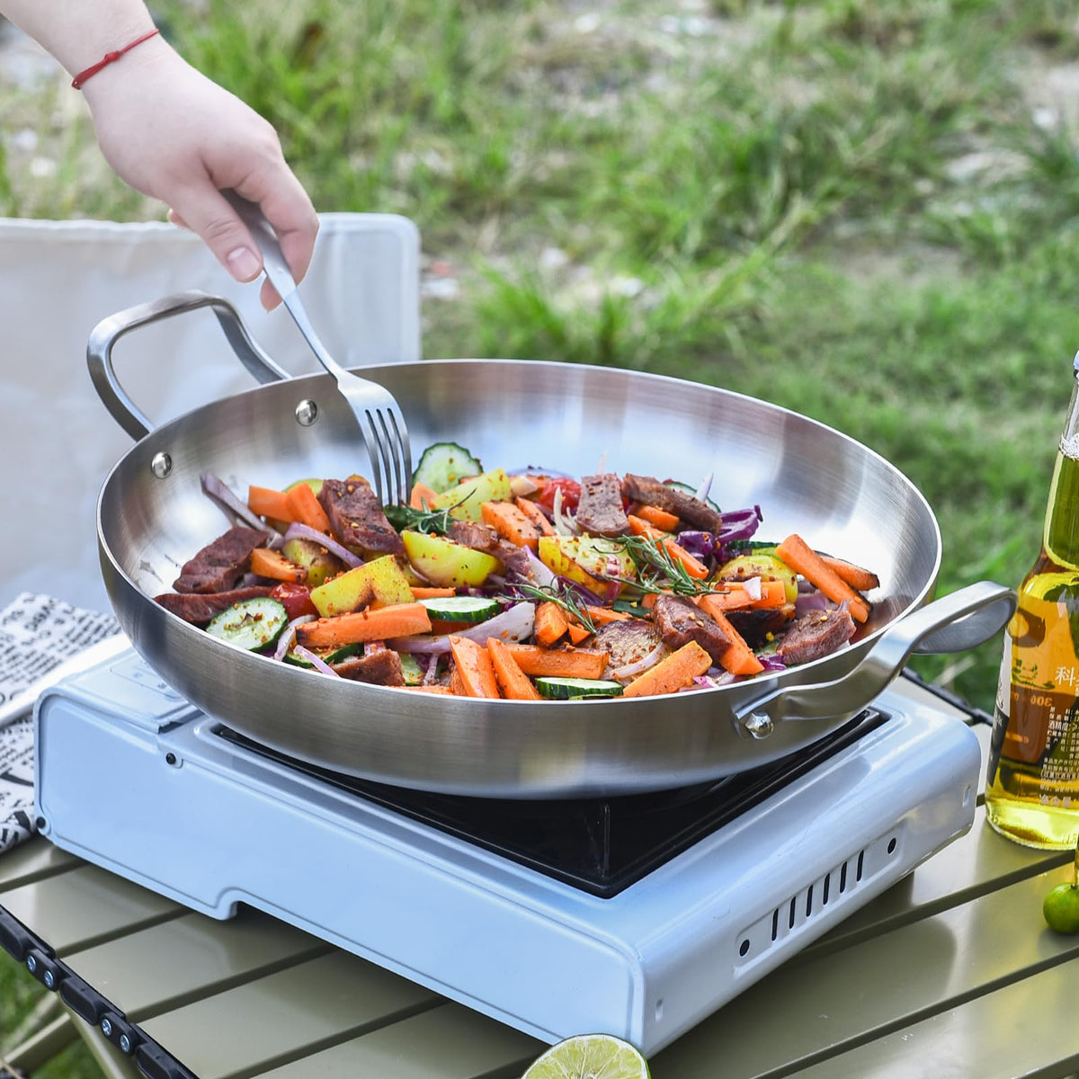 Inqibee paella pan is oven-safe for finishing dishes in the oven.