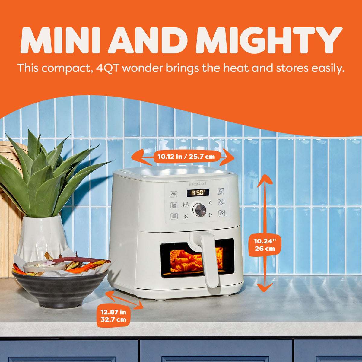 Instant Pot VORTEX Mini drawer-open view highlights easy-access basket for quick meals.
