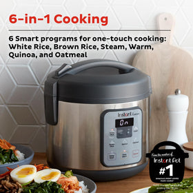 Instant Pot Zest steaming tray in use for vegetables and proteins.