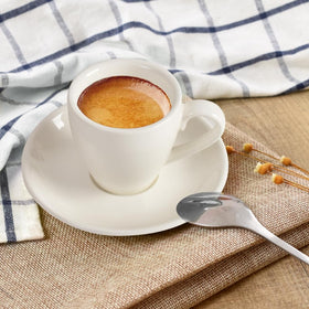 ionEgg stainless steel mini spoons accompany the cup for precise dosing.