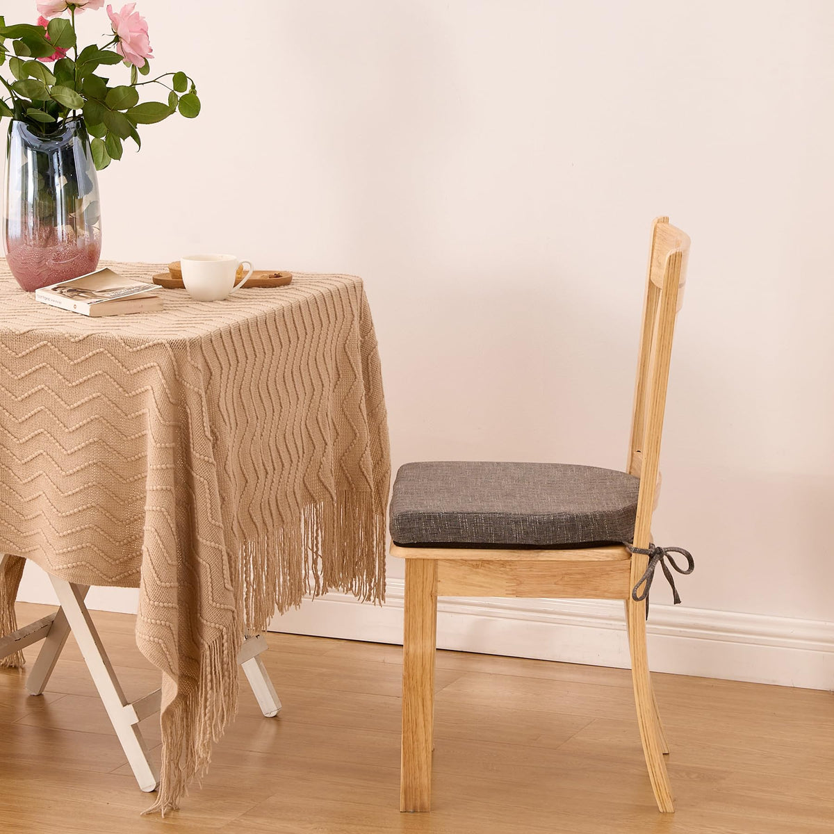 IPYNBAP dining-room setup showcasing versatile indoor use with comfy chair cushions.