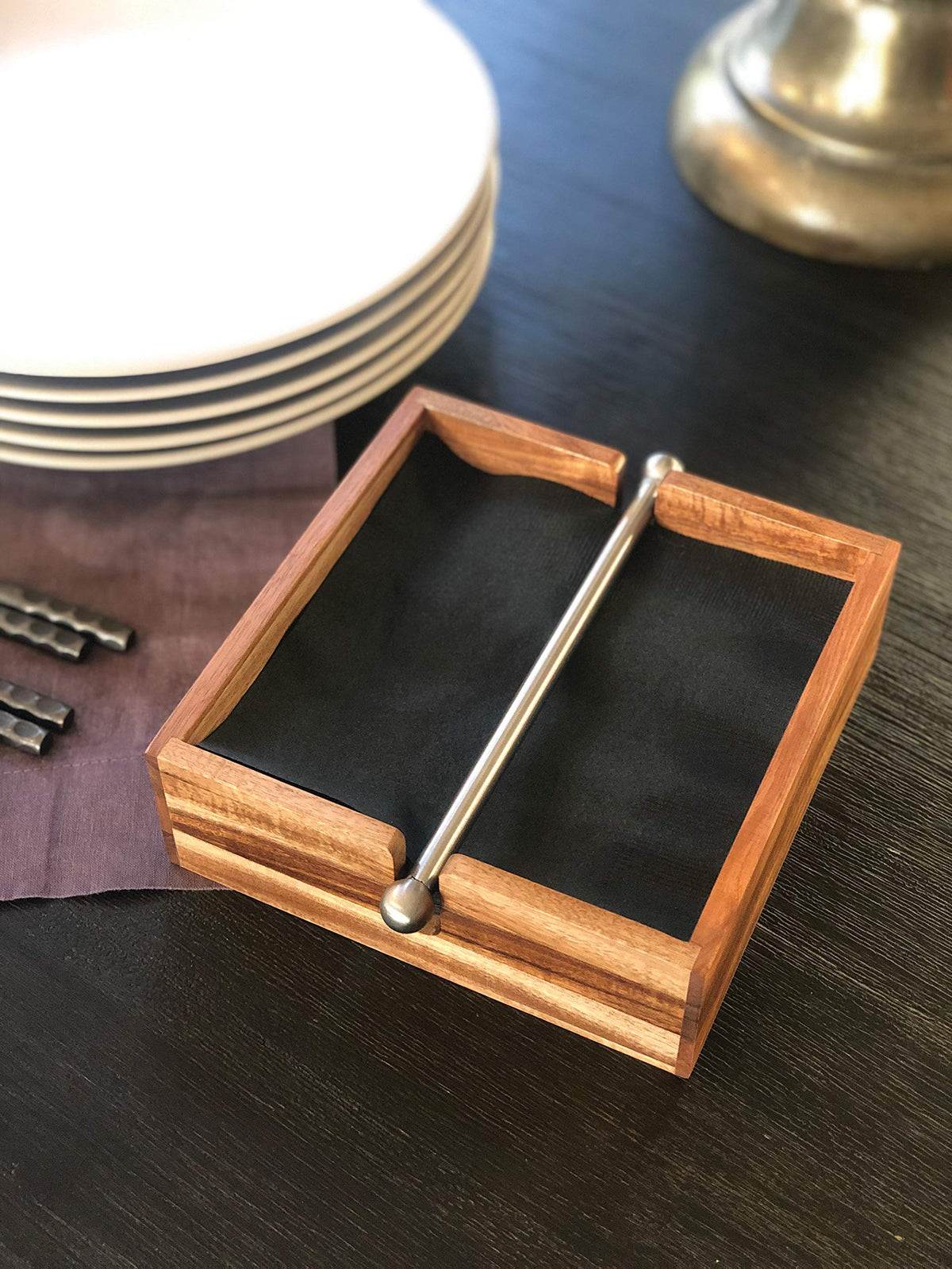 Ironwood Gourmet brown napkin holder in acacia wood suits rustic and modern tables.