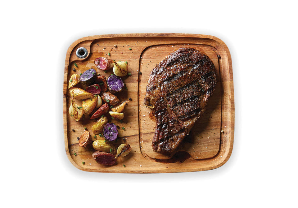 Ironwood Gourmet Fort Worth steak plate with juice channel for cleaner serving.