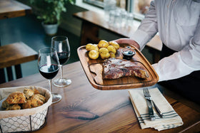 Ironwood Gourmet steak plate with grommet display for stylish kitchen storage.