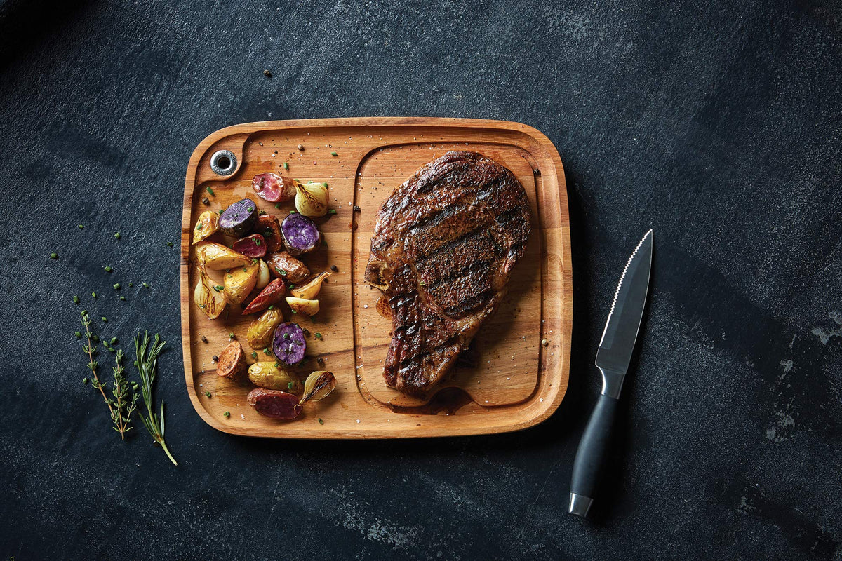 Ironwood Gourmet steak plate with grommet for wall display.