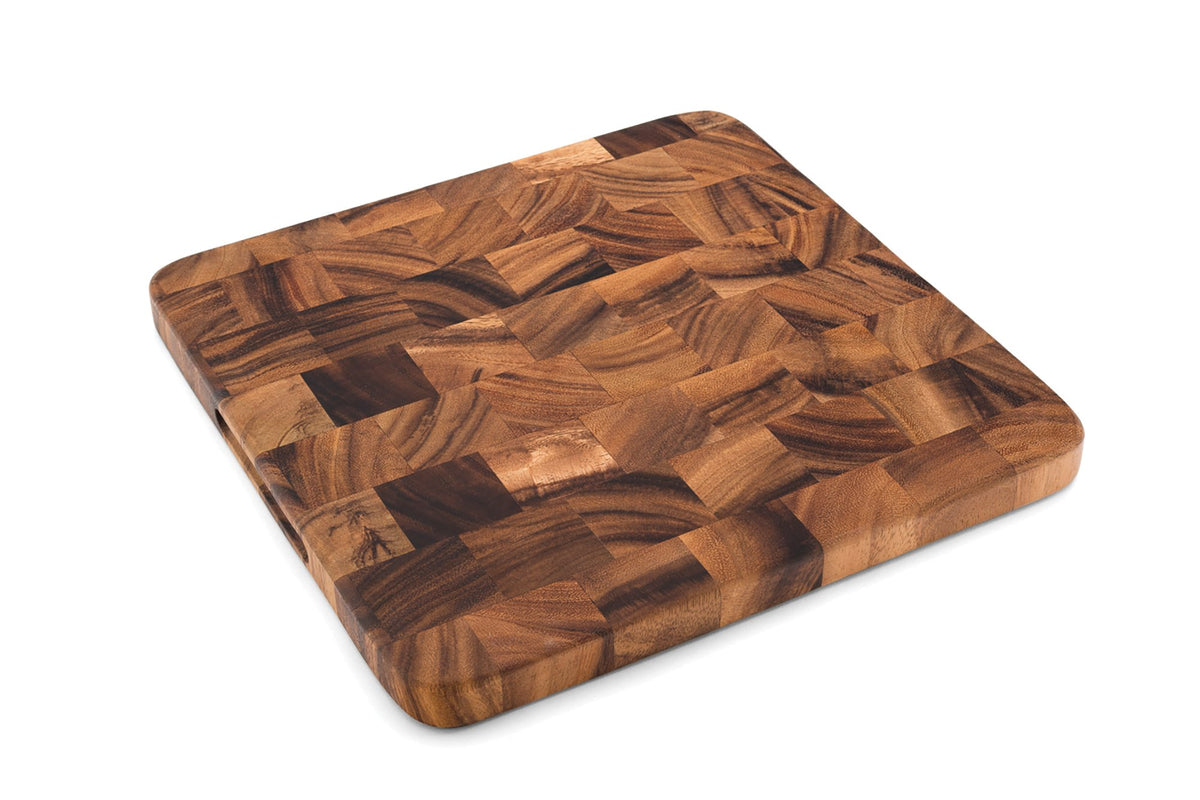 Ironwood Oslo end-grain square cutting board close-up for knife-friendly prep.
