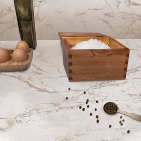 Itomoyo acacia wood surface where oils bead off, helping maintain finish.