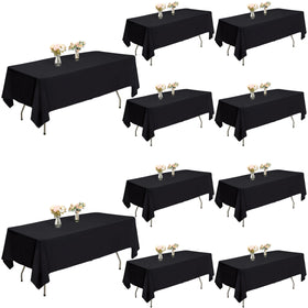 ITWMTTO black rectangular tablecloth on 60x102 inch table, ideal for weddings and banquets.