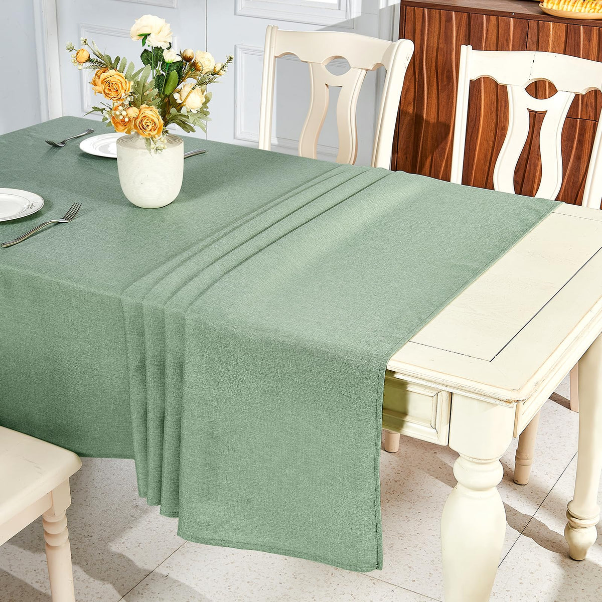 IVAPUPU wedding dining setup with sage green tablecloth for elegant ambience.