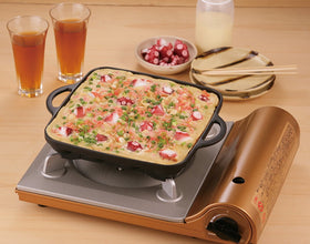 Compact medium size is suitable for small kitchens and batch cooking.