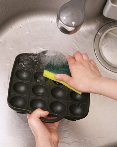Close-up of hole pattern and nonstick surface for easy batter release.